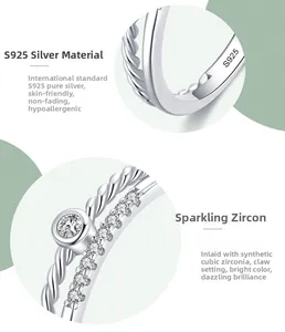 Macro de la bague double en argent S925 avec texture torsadée et zircons scintillants