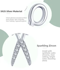 Detailed view of S925 sterling silver studs with prong-set cubic zirconia stones