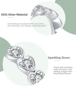 Macro detail of S925 sterling silver heart ring with prong-set cubic zirconia stones