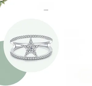 Macro detail of S925 silver star ring with double-layer band and polished finish