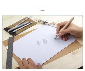 Macro shot of a designer sketching a geometric triangle earring with pavé diamonds