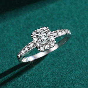 Elegant S925 silver halo ring with radiant cut central stone and pavé diamond band