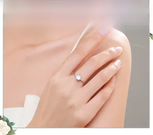 Detailed close-up of a 925 sterling silver ring with a sparkling 1ct solitaire diamond