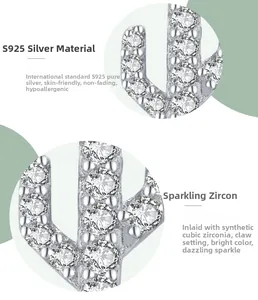 Macro detail of S925 sterling silver cactus earrings with shimmering pavé zircon stones
