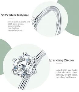 Détail de l'anneau torsadé en argent 925 avec serti six griffes en zircone cubique