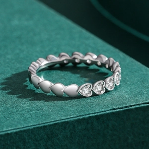 Elegant S925 silver heart ring featuring sparkling pavé diamonds in a stacked design