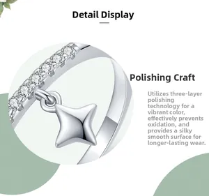 Détail d'une bague en argent S925 avec rangée de zircons et pendentif étoile poli brillant