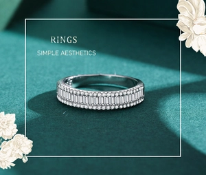 Detailed macro view of an S925 silver ring featuring baguette and round cut cubic zirconia