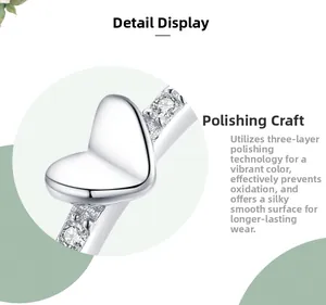 Detailed view of polished S925 silver heart ring featuring sparkling zircon inlay details