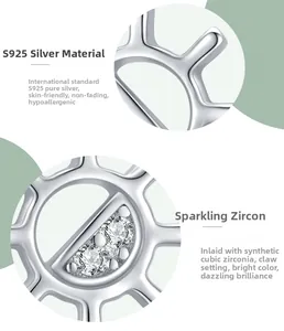 Macro detail of S925 sterling silver sunflower earrings with sparkling cubic zirconia pavé
