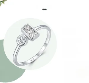 Detail of S925 sterling silver ring featuring a rectangle and round cut cubic zirconia
