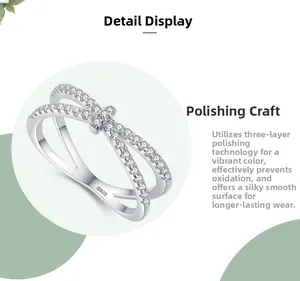 Detail of S925 sterling silver ring with triple-polished cross band and zircon inlay