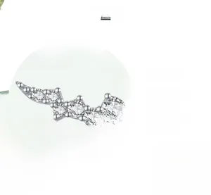Macro detail of polished s925 silver earring featuring five graduated sparkling zircon stones