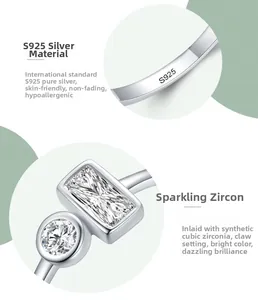 Detailed view of S925 sterling silver ring with emerald and round cut cubic zirconia