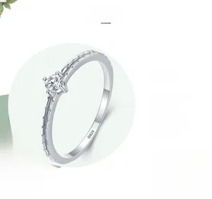 Detailed view of S925 sterling silver ring with hallmark and four-prong diamond setting