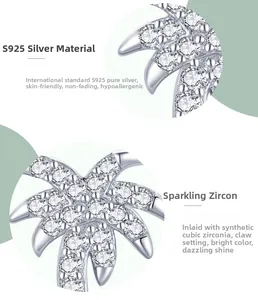 Macro detail of S925 sterling silver coconut tree stud with cubic zirconia in claw setting