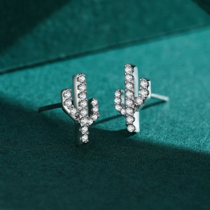 S925 sterling silver cactus stud earrings with micro-pave cubic zirconia on green velvet
