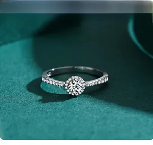 Macro detail of S925 sterling silver halo ring featuring a brilliant round center stone