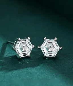 Macro shot of 925 silver hexagonal cut stud earrings with six-prong setting detail