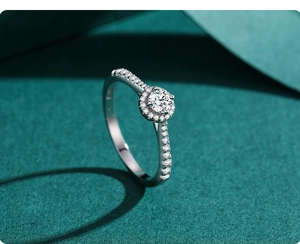 Macro view of S925 sterling silver halo ring with round brilliant-cut simulated diamond