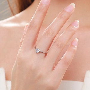 Classic S925 sterling silver four-prong solitaire ring with a round brilliant cut zircon