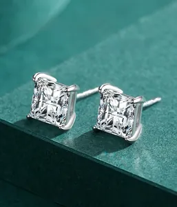 Detail of square-cut cubic zirconia earrings in 925 sterling silver four-prong setting