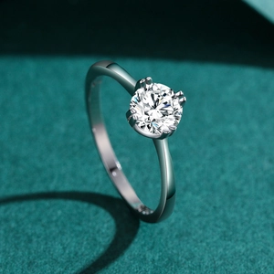 Classic S925 sterling silver four-prong solitaire ring with a brilliant round diamond