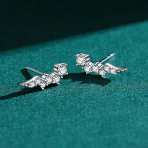 Elegant s925 silver stud earrings featuring irregular wave design and sparkling zircons