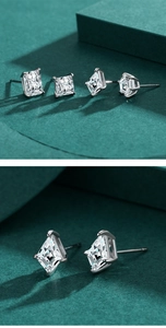 Makro-Detail von S925 Silbersteckern mit funkelnden Zirkoniasteinen in Krappenfassung