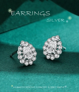Macro shot of S925 silver stamp on teardrop earrings with halo cubic zirconia