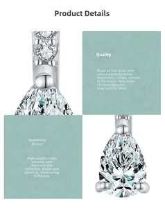 Macro detail of S925 sterling silver pear-shaped CZ earring with polished mirror finish