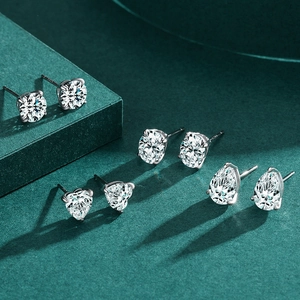 Set of four S925 sterling silver stud earrings featuring round oval heart and pear cut gems