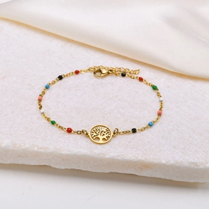 Detail of gold-plated stainless steel chain with colorful beads and Tree of Life pendant