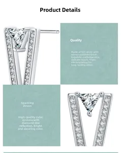 Detailed macro view of S925 sterling silver V-shape stud earrings with cubic zirconia