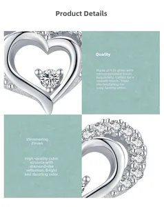 Detailed macro view of S925 sterling silver heart earrings with sparkling cubic zirconia
