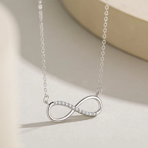 S925 sterling silver infinity pendant necklace with sparkling cubic zirconia inlay