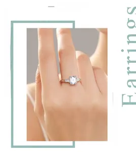 Macro shot of s925 silver ring featuring emerald cut center stone and tapered side baguettes