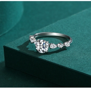 Macro shot of S925 sterling silver stamp and sparkling teardrop accents on diamond ring