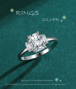 Macro detail of radiant cut rectangular diamond ring with baguette side stones in S925 silver