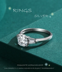 Macro detail of S925 sterling silver stamp on a three-stone cushion-cut ring