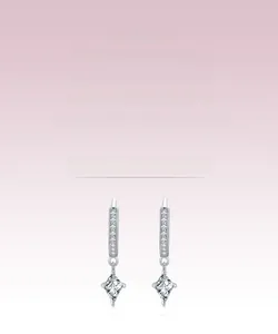 Close-up of S925 sterling silver drop earrings with rhombic cubic zirconia crystals