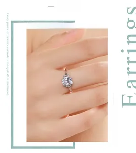 Detail of s925 silver three-stone ring featuring a rectangle cut sparkling zircon on finger