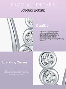 Macro view of 925 sterling silver bubble earrings with cubic zirconia and mirror polish