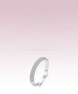 Macro shot of S925 sterling silver ring featuring triple rows of sparkling cubic zirconia