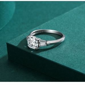 Macro shot of S925 sterling silver ring with cushion-cut zircon and baguette stones
