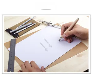 Hand-drawn design sketch of S925 sterling silver diamond earrings on a wooden desk