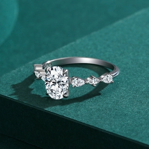 Elegant S925 sterling silver ring featuring oval center stone with teardrop accents