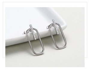 Detail of S925 sterling silver geometric earring with micro-paved cubic zirconia