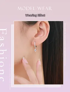 Close-up of s925 sterling silver water drop earrings with shimmering teardrop zirconia