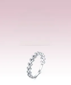 Detail of s925 silver leaf ring with micro-set diamonds and exquisite olive branch design